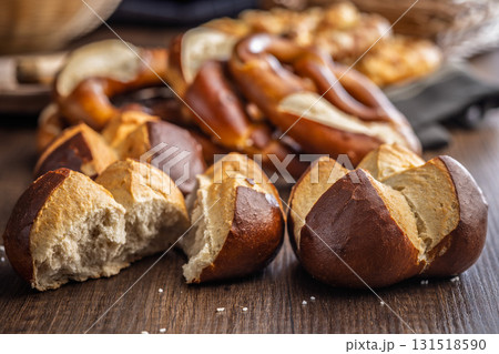 Crunchy bavarian buns on wooden table. 131518590