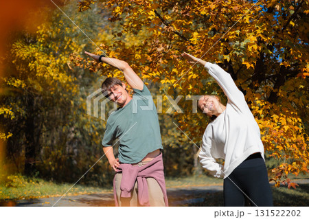 Cardio endurance exercises, use a fitness watch and an app. Runners athletes in fitness clothes. 131522202