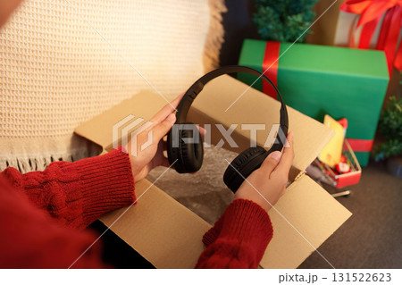 Unboxing new headphones for Christmas gift 131522623