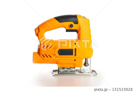 A modern, new electric hand-held jigsaw on a white background, isolated. Power tool for woodworking, close-up 131523028