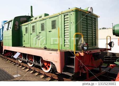 Vintage green locomotive on display at a railway museum showcasing historical transportation technology Vintage green locomotive on display at a railway museum showcasing historical transportation technology 131523081