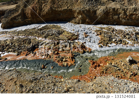 Toxic mine water discharge, acid mine drainage contaminates the environment 131524081