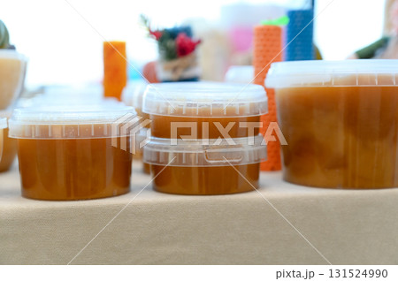 Homemade honey and jam in glass jars Homemade honey and jam in glass jars 131524990