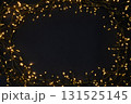 Christmas string lights glowing on black background, festive holiday garland decoration, top view celebration concept 131525145
