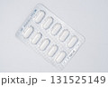 Pills blister pack on white background, top view medical concept, healthcare, pharmacy, medication, and pharmaceutical product 131525149