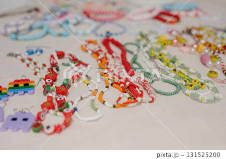 A collection of children's beaded bracelets with cute figures and hearts. A collection of children's beaded bracelets with cute figures and hearts. 131525200