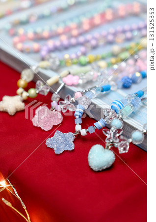 A collection of children's beaded bracelets with cute figures and hearts. A collection of children's beaded bracelets with cute figures and hearts. 131525353