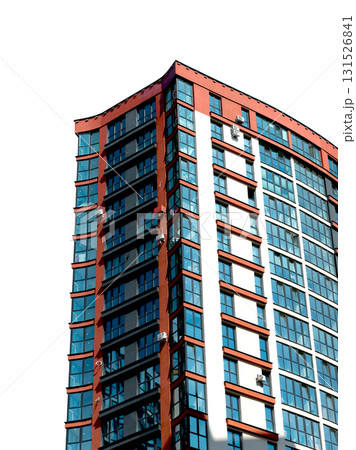 Modern multistorey condominium with glass facade, balconies and contemporary design in sunny urban 131526841