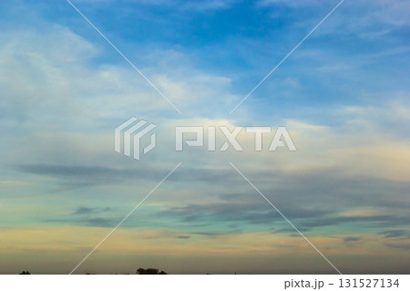 Ornamental clouds. Dramatic sky. Epic storm cloudscape Soft sunlight. Panoramic image texture background graphic resources design Meteorology, heaven hope peace concept 131527134