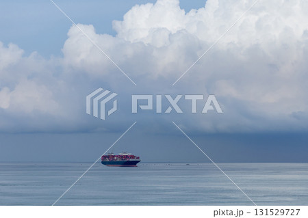 Container ship cargo shipping business logistic import and export freight transportation by container ship in open sea, Container loading cargo freight ship boat. Container ship cargo shipping business logistic import and export freight transportation by container ship in open sea, Container loading cargo freight ship boat. 131529727