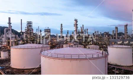 Aerial view oil and gas refinery plant at night, Global business energy logistic transportation, Oil and gas refinery petrochemical industrial, Petrochemical refinery industrial energy supply chain. 131529736