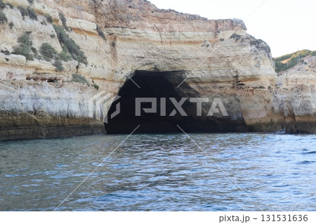 Sunlit Coastal Cliff in Algarve, Portugal Sunlit Coastal Cliff in Algarve, Portugal 131531636