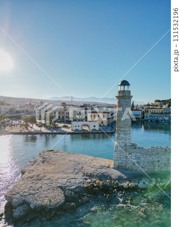 Egyptian lighthouse in the Venetian harbour of Rethymno and waterfront of Crete most beautiful town Egyptian lighthouse in the Venetian harbour of Rethymno and waterfront of Crete most beautiful town 131532196