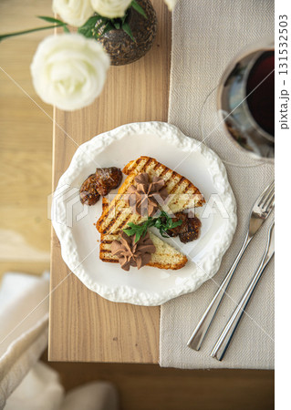Chicken liver pate on grilled toast with fig jam Chicken liver pate on grilled toast with fig jam 131532503