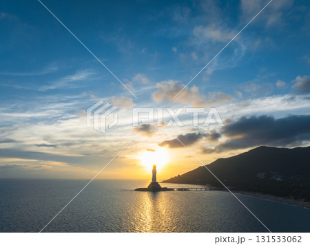 Guanyin statue at seaside in nanshan temple, hainan island , China. Words mean mercy and blessing. 131533062