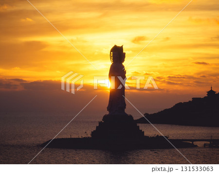 Guanyin statue at seaside in nanshan temple, hainan island , China. Words mean mercy and blessing. 131533063