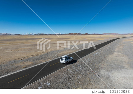 Driving car on the high altitude trail 131533088