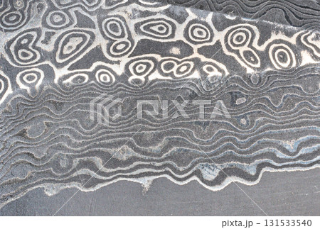 Damascus steel knife texture, full frame Damascus steel knife texture, full frame 131533540