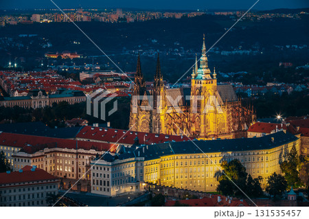 Prague, Czech Republic. Night View Of Prague Castle, St. Vitus Cathedral. Lesser Town, Prague Castle In Night Lighting Illumination. Famous Landmark, UNESCO World Heritage Prague, Czech Republic. Night View Of Prague Castle, St. Vitus Cathedral. Lesser Town, Prague Castle In Night Lighting Illumination. Famous Landmark, UNESCO World Heritage 131535457