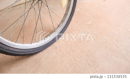 2. Close up of flat bicycle tire on concrete road 131538535