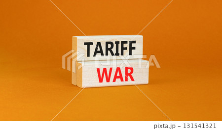 Trade tariff war symbol. Concept word Tariff war on beautiful wooden blocks. Beautiful orange paper background. Business trade tariff wars concept. Copy space. Trade tariff war symbol. Concept word Tariff war on beautiful wooden blocks. Beautiful orange paper background. Business trade tariff wars concept. Copy space. 131541321