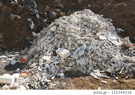 Pile of broken garbage plaster at construction site. Pile of broken garbage plaster at construction site. 131544156