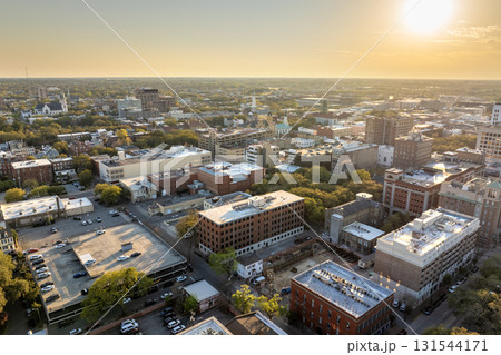 Old historic city architecture in Southern USA. View from above of illuminated streets of Savannah, Georgia at night Old historic city architecture in Southern USA. View from above of illuminated streets of Savannah, Georgia at night 131544171