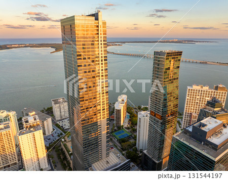 Miami downtown office district in Florida, USA at sunset. High commercial and residential skyscraper buildings in modern American coastal city 131544197