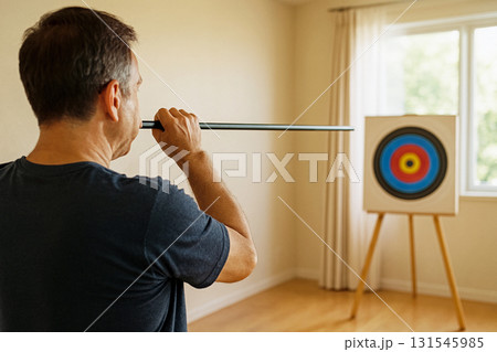 スポーツ吹き矢をする男性 131545985