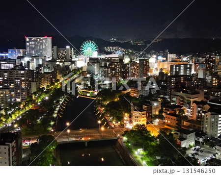 甲突川沿いから鹿児島市の中央駅方面の夜景の空撮 131546250