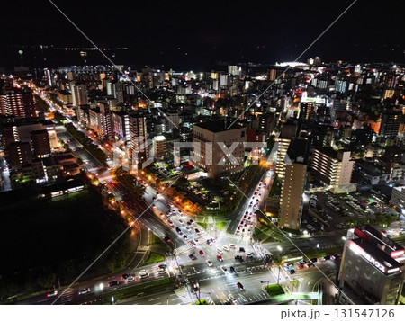 甲突川沿いから鹿児島市新屋敷方面の夜景の空撮 甲突川沿いから鹿児島市新屋敷方面の夜景の空撮 131547126