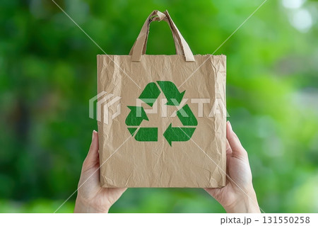 Woman Holding Recycling Paper Bag Outdoors 131550258
