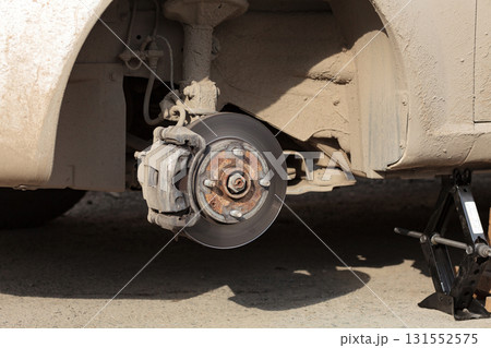 Closeup shot of car's disc brake without wheel on it 131552575