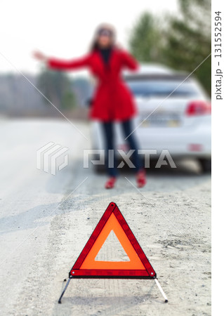 red emergency stop sign with a broken car 131552594