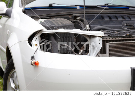 Malfunctioning car with opened hood 131552623