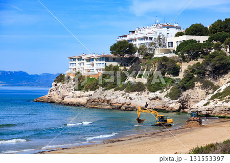 View of the empty beach with the bulldozer and the excavator 131553397