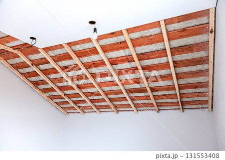 house attic under construction, mansard wall ceiling house attic under construction, mansard wall ceiling 131553408