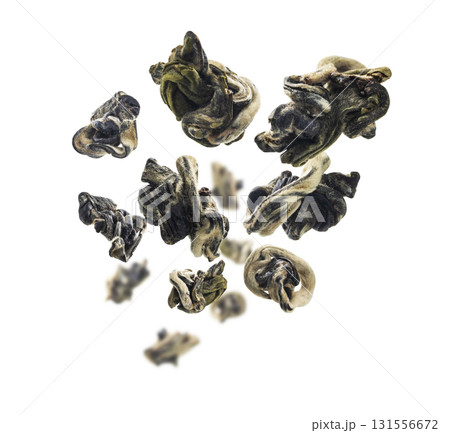 Dried Oolong tea levitates on a white background 131556672