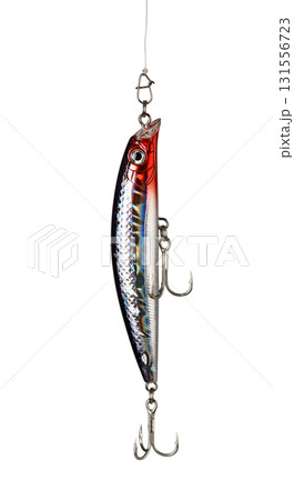 Fishing lure hanging on a fishing line, ready for action Fishing lure hanging on a fishing line, ready for action 131556723