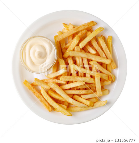 French fries with mayonnaise on white plate: delicious fast food meal 131556777