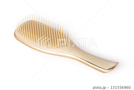 Modern hairbrush with golden details lying on transparent background Modern hairbrush with golden details lying on transparent background 131556960