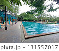 A Serene and Inviting Sunlit Swimming Pool Oasis 131557017