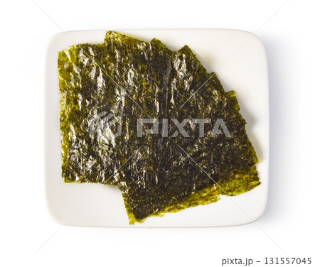 Roasted seaweed snack gim on white plate Roasted seaweed snack gim on white plate 131557045