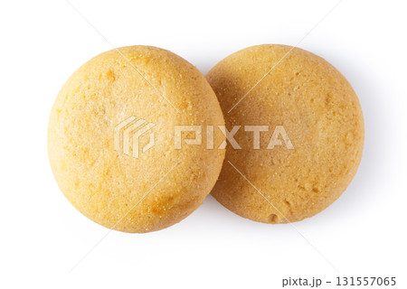 Two round baked shortbread cookies on white background 131557065