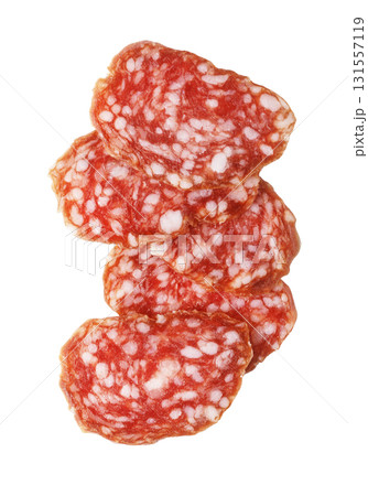 Salami slices stacked on white background 131557119