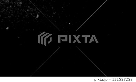 Freeze motion of dust particles flying , isolated on black background 131557258