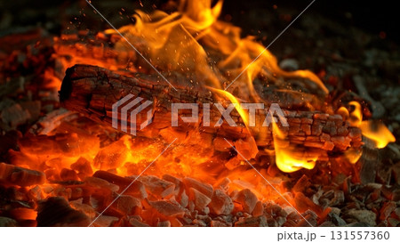 Detail Shot of Hot Embers with Flying Sparks Detail Shot of Hot Embers with Flying Sparks 131557360