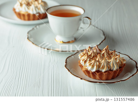 Meringue tart on a white table. 131557486