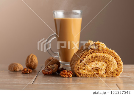 Walnut and buttercream roll: a traditional Oriental pastry. Walnut and buttercream roll: a traditional Oriental pastry. 131557542