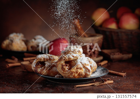 Homemade mini apple strudels with apples and cinnamon. Homemade mini apple strudels with apples and cinnamon. 131557574